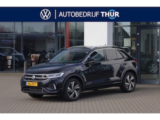 Volkswagen T-Roc 1.5 TSI R-Line 150PK / 110kW Achteruitrijcamera, draadloos Apple Carplay & Android Auto, verwarmbare voorstoelen + stuurwiel, dodehoeksensor (Side Assist), parkeerassistent (Park Assist), volledig digtiaal instrumentenpaneel (Digital Cockpit Pro), full LED koplampen, grootlichtassistent, voorstoelen Top-Comfort, parkeersensoren voor + achter, achterklep elektrisch met sensorsturing (Easy Open), DAB+, geen navigatie (bestelbaar), zwarte hemel, extra getint glas achter, 18'' LMV 'Nevada'