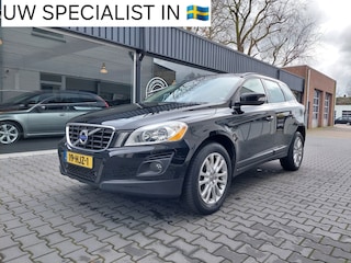 Volvo XC60 2.4 D5 AWD Momentum Dealer onderhouden Origineel NL Trekhaak Clima PDC 18 inch Stoelverwarming Regensensor