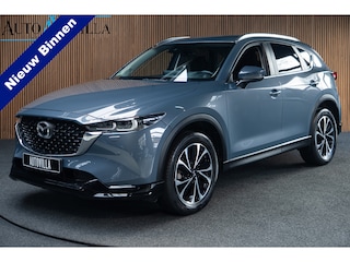 Mazda CX-5 2.0 e-SkyActiv-G M Hybrid 165 HUD Navi 360 ° PDC Stuur- & stoelverwarming Elektr. bedienbare achterklep Climate C. Cruise C. LM velgen Splinternieuw!