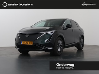 Nissan Ariya Advance 91 kWh | SOH 98% | Ele.verstelbare stoelen | Digitaal Dashboard | Navigatie | 360 Camera | LED | DAB | Apple CarPlay/ Android Auto | Rijassistent-Systeem | Ele. achterklep | Adaptieve Cruise Control |