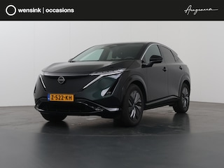 Nissan Ariya Advance 91 kWh | SOH 98% | Ele.verstelbare stoelen | Digitaal Dashboard | Navigatie | 360 Camera | LED | DAB | Apple CarPlay/ Android Auto | Rijassistent-Systeem | Ele. achterklep | Adaptieve Cruise Control |
