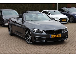 BMW 4-serie Cabrio 420i High Executive Ed. M Sport / Camera / Leder / Harman Kardon / Nekverwarming / 19'' / Navigatie / Windscherm / DAB / Stoelverwarming / Cruise Control