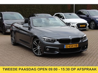 BMW 4-serie Cabrio 420i High Executive Ed. M Sport / Camera / Leder / Harman Kardon / Nekverwarming / 19'' / Navigatie / Windscherm / DAB / Stoelverwarming / Cruise Control