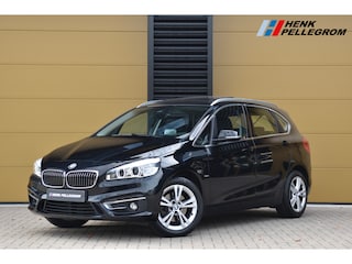 BMW 2-serie Tourer 220i Centennial High Executive * Head-up * LED * Panoramadak * Lichtpakket * Dealeronderhouden *