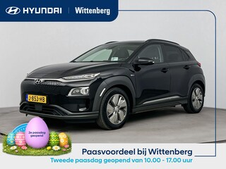 Hyundai Kona EV PREMIUM 64 kWh | 3 FASE | WARMTEPOMP | LEDER | CLIMA | CRUISE ADAPTIEF | CAMERA | NAVI | STOEL- & STUURVERWARMING | 17'' LM VELGEN | PDC VOOR & ACHTER |