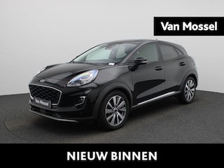 Ford Puma 1.0 EcoBoost Hybrid Titanium | Automaat | LMV | Trekhaak | Navigatie | Stoel/Stuur verwarming | Winter pack | Half Leder | Elec. Achterklep | Climate control | Parkeer sensoren | Cruise control | DAB | Camera |