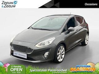 Ford Fiesta 1.0 EcoBoost Titanium | Dealer onderhouden | Automaat | Winter pack | Parkeersensor voor en achter | Achteruitrijcamera | 17" lichtmetalen velgen | Navigatie | Apple carplay & Android auto | Cruise control | Privacy glas |