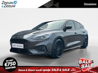 Ford Focus 2.3 EcoBoost ST-3 | 280 PK | Launch control | Recaro stoelen | 19" inch lichtmetalen velgen | Navigatie | Parkeersensor voor en achter | Achteruitrijcamera | Bang & Olufsen audio | Stoelverwarming | Voorruitverwarming | Draadloos opladen mobiel | Cruise control | 12 maanden garantie! |