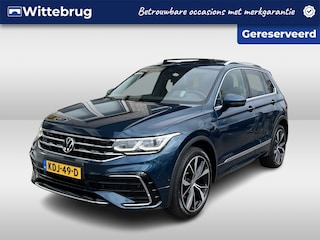 Volkswagen Tiguan 1.4 TSI eHybrid R-Line / AUTOMAAT/ PANO/ 245 PK/ TREKHAAK/ DCC/ ELEK.KLEP/ PARK.SENSOR.V+A/ 360 CAMERA/ STUUR+STOELVERWARM./ ACC/ KEYLESS/ APP-CONNECT/ HEAD-UP/ NAVI/ DAB/ CLIMA/ LED