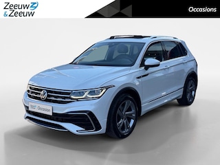 Volkswagen Tiguan 1.5 TSI R-Line Business+ | Automaat | Elektrisch uitklapbare trekhaak | Glazen schuif-/kanteldak | Elektrisch bedienbare achterklep | Stoel- en stuurverwarming | Achteruitrijcamera | Head-up display