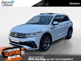 Volkswagen Tiguan 1.5 TSI R-Line Business+ | Automaat | Elektrisch uitklapbare trekhaak | Glazen schuif-/kanteldak | Elektrisch bedienbare achterklep | Stoel- en stuurverwarming | Achteruitrijcamera | Head-up display