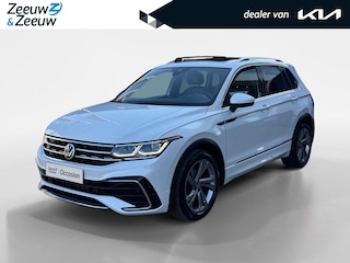 Volkswagen Tiguan 1.5 TSI R-Line Business+ | Automaat | Elektrisch uitklapbare trekhaak | Glazen schuif-/kanteldak | Elektrisch bedienbare achterklep | Stoel- en stuurverwarming | Achteruitrijcamera | Head-up display