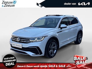 Volkswagen Tiguan 1.5 TSI R-Line Business+ | Automaat | Elektrisch uitklapbare trekhaak | Glazen schuif-/kanteldak | Elektrisch bedienbare achterklep | Stoel- en stuurverwarming | Achteruitrijcamera | Head-up display