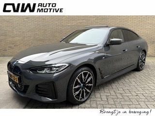 BMW i4 eDrive40 M-sport 84kWh | Panoramadak | ACC | Wegklapbare trekhaak | Sportstoelen | Leder/Alcantara | Head up | Harman&Kardon | Navigatie | Camera | Dodehoekdetectie | 19 inch M-velgen | LED | DAB | Apple CarPlay | Volledig dealeronderhouden!