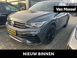 Volkswagen Tiguan 1.4 TSI eHybrid R-Line | 245 PK Automaat | SoH 91% | Black Style | 360* Camera | Trekhaak | 20' Inch | Panorama Dak | Navigatie PRO (Groot Scherm) | Digital Cockpit PRO | Keyless | Stoelverwarming