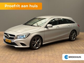Mercedes-Benz CLA Shooting Brake 180 OrangeArt Edition Leder/Stof Sportstoelen | Stoelverwarming | Parkeersensoren Rondom | Airco | Cruise | 17" Lichtmetaal | 360° Parkeersensoren | AMG-styling | Airco