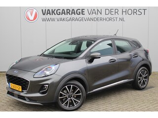 Ford Puma 1.0-125pk EcoBoost Mild-Hybrid Titanium. Fabrieksgarantie t/m 21-05-2027 ! Slechts 14.800km ! Volautm. airco, pdc achter, all season banden, stoel-, stuur- en voorraamverw., navigatie, telefoonvoorb., elektr. achterklep, cruise cntrl, keyless entry&go etc.