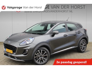 Ford Puma 1.0-125pk EcoBoost Mild-Hybrid Titanium. Fabrieksgarantie t/m 21-05-2027 ! Slechts 14.800km ! Volautm. airco, pdc achter, all season banden, stoel-, stuur- en voorraamverw., navigatie, telefoonvoorb., elektr. achterklep, cruise cntrl, keyless entry&go etc.