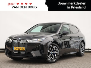 BMW iX xDrive40 Business Edition Plus 77 kWh | 360° camera | Harman Kardon | Leder | Stoelverw. v+a | HUD | Trekhaak | 22'' velg | Elektr. voorstoelen + memory | Stuurverwarming | Org. NL |