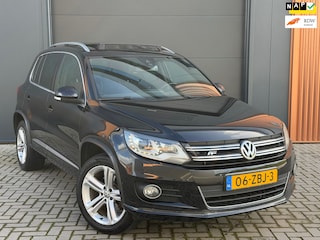 Volkswagen Tiguan 1.4 TSI Sport&Style R-Line|100% onderhouden|Pano|Camera|Trekhaak|Navi|Lane Assist|Verkeersbordherkenning
