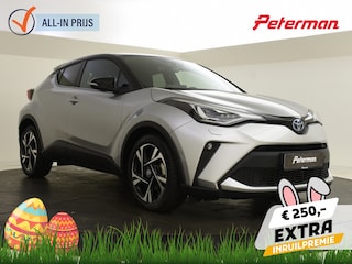Toyota C-HR 1.8 Hybrid Bi Tone | lage km-stand | PDC | Navigatie | BLIS |