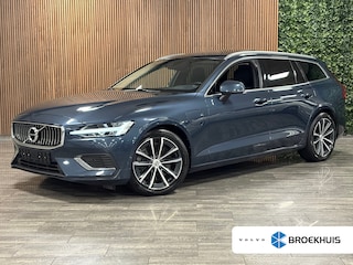 Volvo V60 T6 AWD Recharge Inscription | Schuifdak | Adaptieve Cruise Control | Stoel en Stuurwielverwarming | Pilot Assist | Parkeercamera | 18 Inch | Keyless Drive | Parkeersensoren voor+achter | Privacy Glass | Elektrisch bedienbare achterklep | Automatisch dimmende binnen en buitenspiegels | Climate Control L+R | DAB Radio | Apple Carplay/Android Auto | Volvo On Call met mobiele App functie | Denim Blue Metallic |
