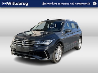Volkswagen Tiguan 1.4 TSI eHybrid R-Line / AUTOMAAT/ LEER/ PANO/ DCC/ APP-CONNECT/ PARK.SENSOR+360 CAMERA/ MEMORY SEAT/ STUUR+STOELVERWARM./ DODEHOEK/ HEAD-UP/ KEYLESS/ ELEK.KLEP/ NAVI/ DAB/ CLIMA/ LED/ 20'' LMV