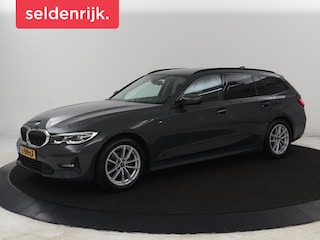 BMW 318i Business Edition | Trekhaak | Sportstoelen | Half leder | Adaptief LED | Carplay | Navigatie | Parkeerhulp | Climate control | Bluetooth | Cruise control