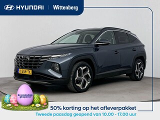 Hyundai Tucson 1.6 T-GDI HEV Premium All season banden | Parkeersensoren | Lederenbekleding | Metallic lak |