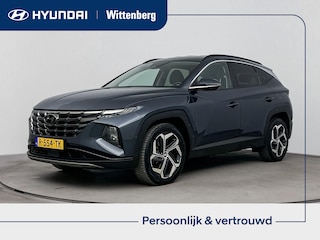 Hyundai Tucson 1.6 T-GDI HEV Premium All season banden | Parkeersensoren | Lederenbekleding | Metallic lak |