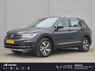 Volkswagen Tiguan 1.4 TSI eHybrid Elegance Automaat / Wegklapbare Trekhaak / Winter-pakket / Trekgewicht 1.800 kg / Stuur- en Stoelverwarming / Voorstoelen met massage functie / Adaptief cruise control / Apple Carplay Android / Achteruitrijcamera /