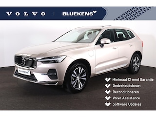 Volvo XC60 T6 Plug-in hybrid AWD Essential Edition Bright Panorama/schuifdak - IntelliSafe Assist - Parkeercamera achter - Verwarmde voorstoelen, stuur & achterbank - Parkeersensoren voor & achter - Draadloze tel. lader - Standkachel - Elektr. inklapbare trekhaak - 18' LMV