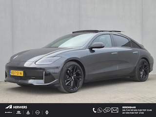 Hyundai Ioniq 6 First Edition AWD 77.4 kWh Automaat / Accu SOH 100% / Dealer onderhouden / Fabrieksgarantie tot 02-2028 / WLTP bereik 519 km bereik stad 658 km / CCS snellader / Trekgewicht 1500 kg / Elektrische achterklep / Glazen schuif- en kanteldak / Stuur- Stoel & Achterbankverwarming /
