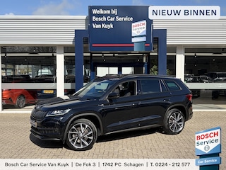 Skoda Kodiaq 2.0 TSI 4x4 Sportline Business / Automaat / 1e-Eigenaar / Open-Panodak / Alcantara / Canton Premium-Audio / Adaptieve Control-Control / Stoelverwarming / Elektr.-Stoelen met Geheugen / Apple-Carplay & Android-Auto / Elektr.-Wegklapbare Trekhaak / Dodehoek-Detectie / Draadloze-Telefoonlader / Keyless / LED / Schakel-Flippers / Climate-Control / Elektr.-Achterklep / DAB Radio-Bluetooth / Navi / PDC V+A / Camera-Achter / 20'' LMV / ENZ.