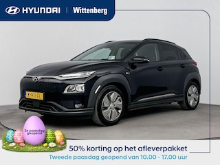 Hyundai Kona EV FASHION 64 kWh | DODEHOEK DETECTIE | PDC | 3 FASEN | WARMTEPOMP | CAMERA | CLIMA | CRUISE ADAPT. | NAVI | STOELVERWARMING | STUURVERWARMING | PRIVACY GLASS |