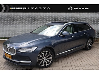 Volvo V90 2.0 T6 AWD Inscription | Plug-in Hybrid (PHEV) | Trekhaak | 360 Graden Camera | Panoramadak | Harman Kardon Audio | Verwarmde Voorruit | Keyless Entry | Elektrisch Verstelbare Voorstoelen | Elektrische Achterklep | BLIS | Cruise Control Adaptief | Navigatie