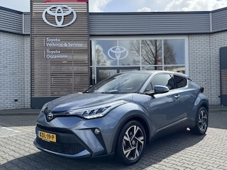 Toyota C-HR 1.8 HYBRID STYLE STOELVERW BLIND-SPOT PARK-SENSOREN NAVI APPLE/ANDROID KEYLESS 18" LM-VELGEN ALL-SEASONS