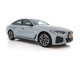 BMW i4 eDrive40 84 kWh M-Sport [ 3-Fase-11 kW ] {SOH-96%} (INCL-BTW) *LEATHER-ALCANTARA | FULL-LED | ADAPTIVE-CRUISE | HEATED-SPORTSEATS | CAMERA | DAB | DIGI-COCKPIT | NAVI-FULLMAP | AMBIENT-LIGHT | ECC | PDC | CARPLAY | KEYLESS | SHIFTPADDLES | 18