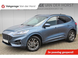 Ford Kuga 2.5-225 pk PHEV ST-Line X. Hybride rijden voor een reëel bedrag ! Slechts 31.500km ! Stoel-, stuur-, achterbank en voorraamverw., B&O soundsyst., Adaptieve Cruise Control, Climate Control dual, Camera v+a, Navigatie, Telefoonvoorb., Side- en lane assist etc.