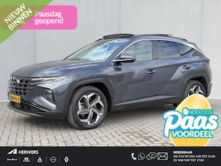 Hyundai Tucson 1.6 T-GDI HEV Premium Sky / Panoramadak / 1650kg Trekgewicht / Fabrieksgarantie tot 3-2028 / Dealer Onderhouden / Stoel Verwarming / Stoel Ventilatie / Stuurwiel Verwarming / Elektr. Verstelbare Stoelen + Memory / Dodehoek Detectie / Camera / Navigatie / Adaptieve Cruise / Elektr. Achterklep / Krell / DAB /