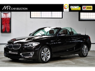 BMW 2-serie Cabrio 220i Centennial High Executive | Xenon | Stoelverwarming | Parkeersensoren | Windscherm | NL auto | 1e eigenaar |