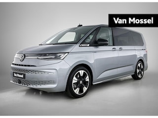 Volkswagen Multivan 1.5 eHybrid L2 Bulli Edition 4Motion 245PK | Automaat | Trekhaak | Elektrische Schuifdeuren | Elektrische Achterklep | Achteruirijcamera | Verwarmbare Voorstoelen | Verwarmbare Voorruit | Trekhaak | 7-Zits Vis-a-Vis | Multifunctioneel Stuurwiel | Verschuifbare Tafel | Adaptive Cruise Controle | Navigatie | IQ.Light | Glazen Panorama Dak |