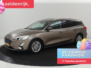 Ford Focus 1.0 EcoBoost Titanium | Stoelverwarming | Trekhaak | Adaptive cruise | Carplay | Keyless | Navigatie | Parkeerhulp | Stuurverwarming | Climate control | Getint glas