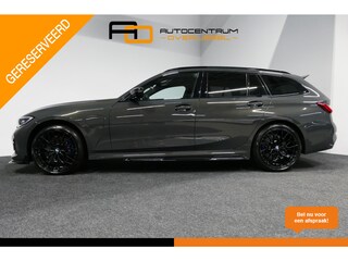 BMW 3-serie Touring 330e xDrive M Sport / M340i Diffuser /  Black Diamond M grille / M340i M Sport bumper pakket / BMW Laser Light / Panoramadak / Premium kleur Dravitgrau / Elektr. verstelbare voorstoelen links met memory / Apple Carplay - Android Auto / Stoelverwarming / HUD / 19'' LMV / Trekhaak (afneembaar) / Lederen bekleding / Adaptief M onderstel