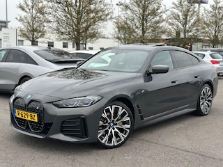 BMW i4 eDrive40 High Executive 84 kWh SoH 93,1% | M Sport | Laser | Schuifdak | Harman/Kardon | Leder