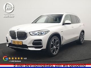 BMW X5 xDrive45e X Line PHEV 395pk Dealer O.H. | Trekhaak Af Fabriek | Luchtvering | Adaptive Cruise | Head Up | 360 Camera | Adaptief Onderstel | Laser LED | Lederen Sportstoelen Memory & Verwarmd | Sfeerverlichting | Keyless | Plug In H