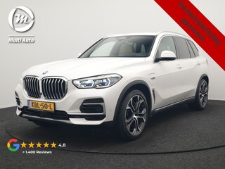BMW X5 xDrive45e X Line PHEV 395pk Dealer O.H. | Trekhaak Af Fabriek | Luchtvering | Adaptive Cruise | Head Up | 360 Camera | Adaptief Onderstel | Laser LED | Lederen Sportstoelen Memory & Verwarmd | Sfeerverlichting | Keyless | Plug In H