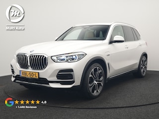 BMW X5 xDrive45e X Line PHEV 395pk Dealer O.H. | Trekhaak Af Fabriek | Luchtvering | Adaptive Cruise | Head Up | 360 Camera | Adaptief Onderstel | Laser LED | Lederen Sportstoelen Memory & Verwarmd | Sfeerverlichting | Keyless | Plug In H