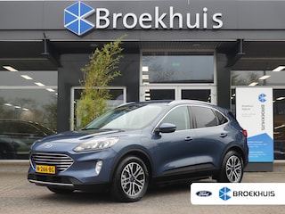 Ford Kuga 2.5 PHEV Titanium | TREKHAAK | CAMERA V+A | ADAPTIVE CRUISE | DODEHOEKDETECTIE | STUUR+STOEL+VOORRUITVERWARMING | ACHTRBANK VERWARMING | APPLE CARPLAY / ANDRIOD AUTO | ELEKTRISCHE ACHTERKLEP | LMV 18" | NAVI |