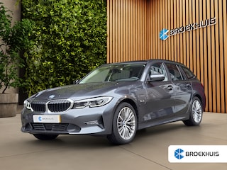 BMW 3-serie Touring 320e Business Edition Plus | Trekhaak | Panoramadak | Stoelverwarming | Leder